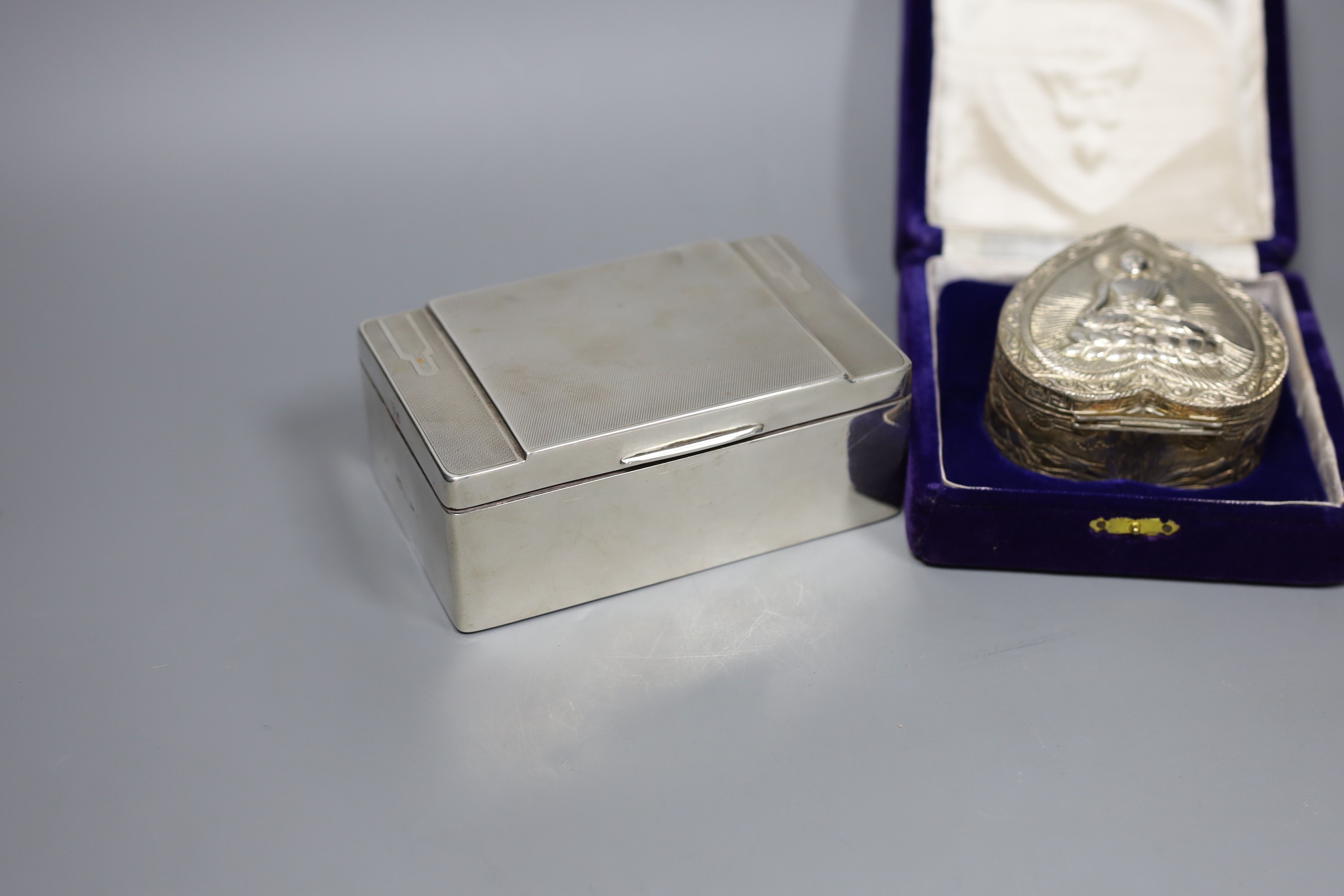 A Victorian engraved silver cream jug, Sheffield 1882, 13cm., engine-turned silver cigarette case, collection of pepper grinders, condiments, etc.